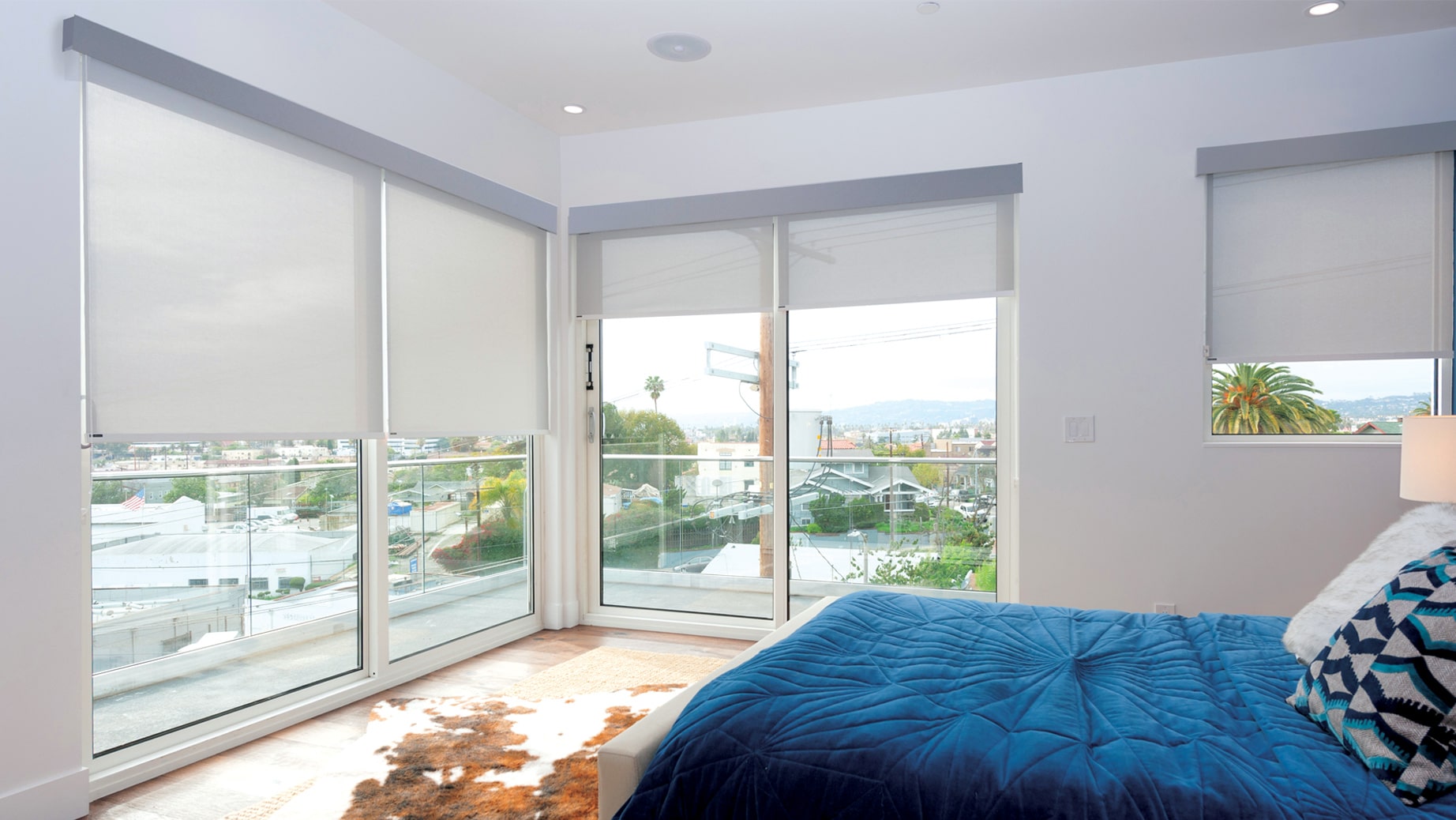 Norman Soluna Roller Shades bedroom with outside view